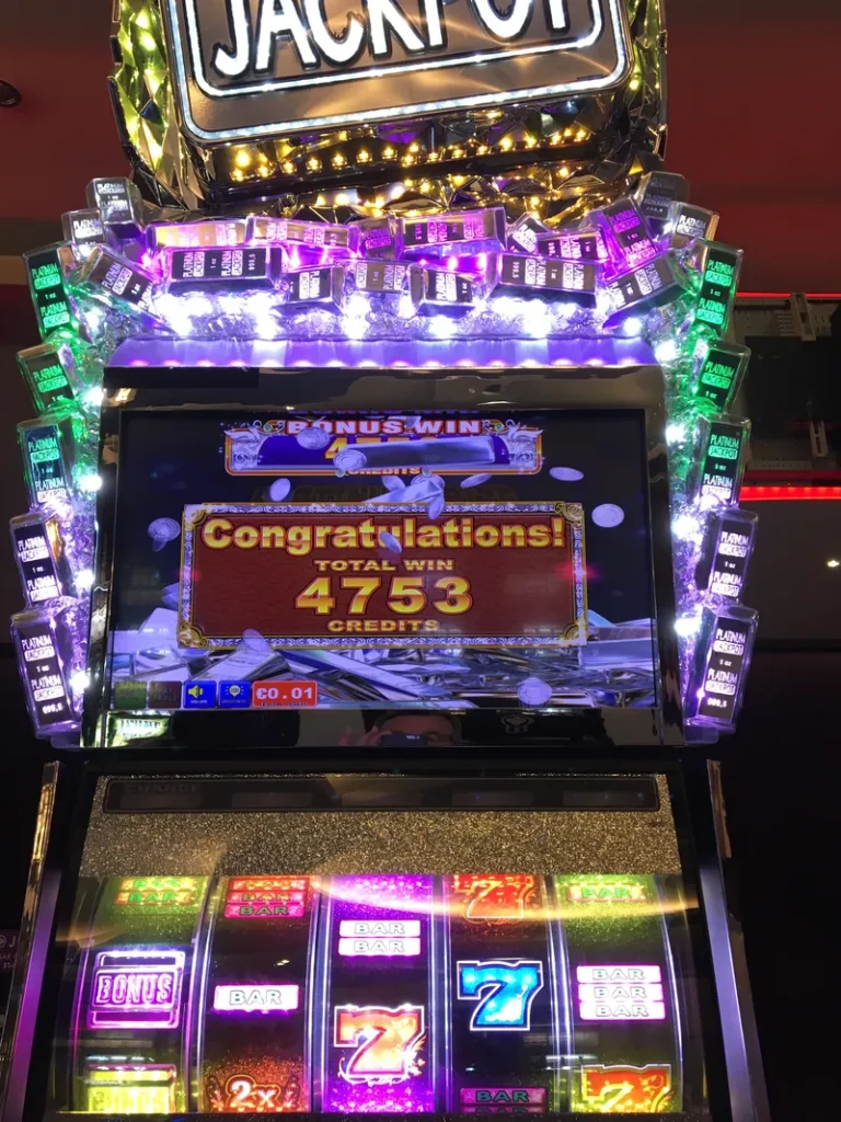 Illuminated jackpot slot machine at Casino JOA César Palace de Saint-Paul-lès-Dax
