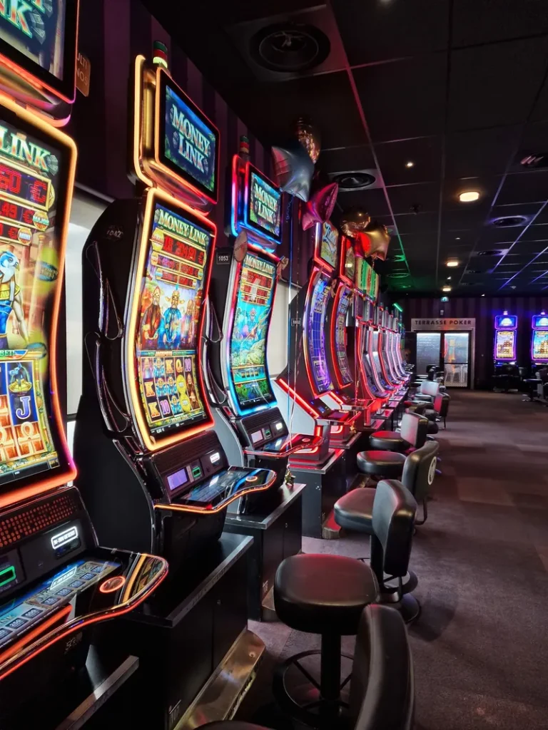 Colourful slot machine aisle at Casino JOA d'Antibes La Siesta