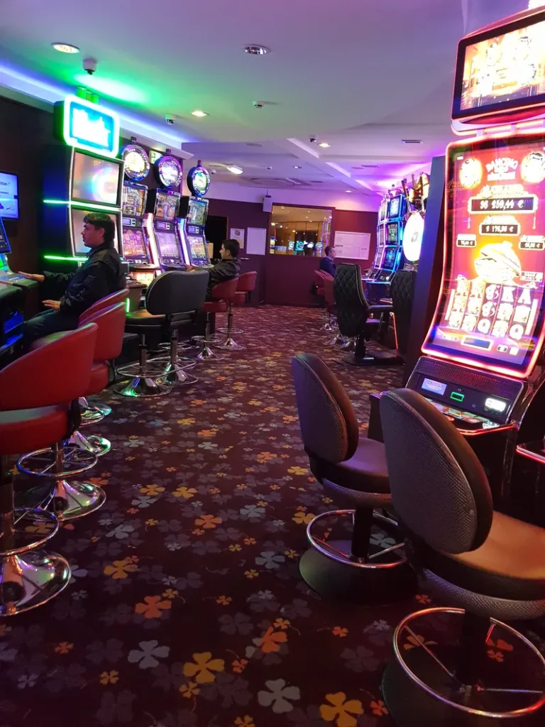 Purple-lit gaming floor at Casino JOA de Saint-Brevin l'Océan