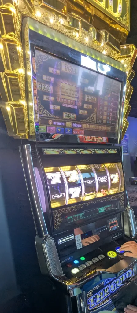 Gold-toned gaming machine at Casino JOA de Saint-Pair