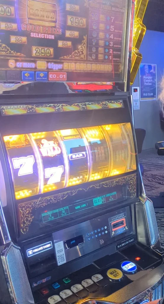 Close-up of illuminated slot reels at Casino JOA de Saint-Pair
