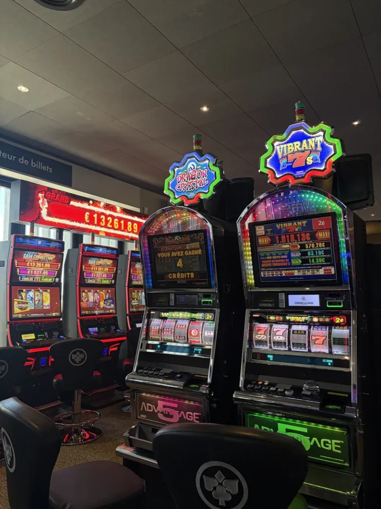 Twin colourful slot machines at Casino JOA du Lac du Der