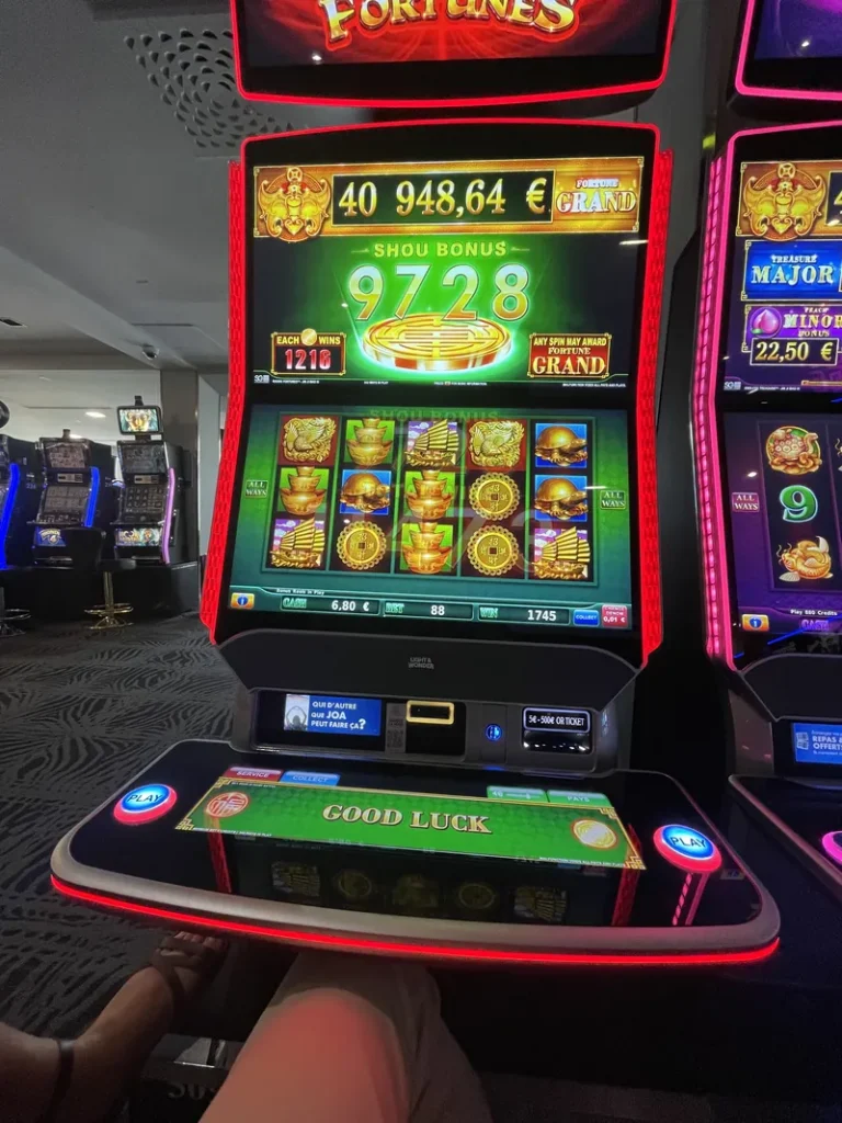 Green-themed gaming machine at Casino JOA du Tréport