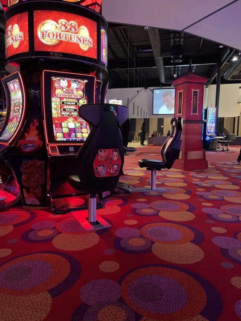 Red slot machine room at Seven Casino