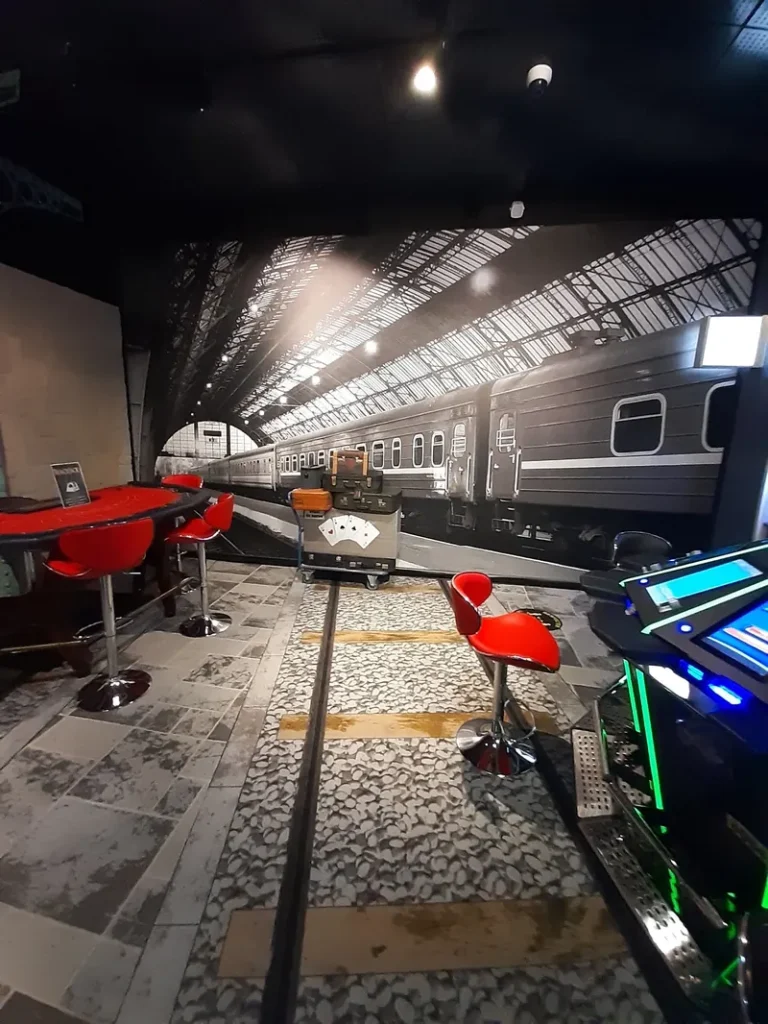 Gaming tables and red chairs at Casino de Bourbon-l'Archambault