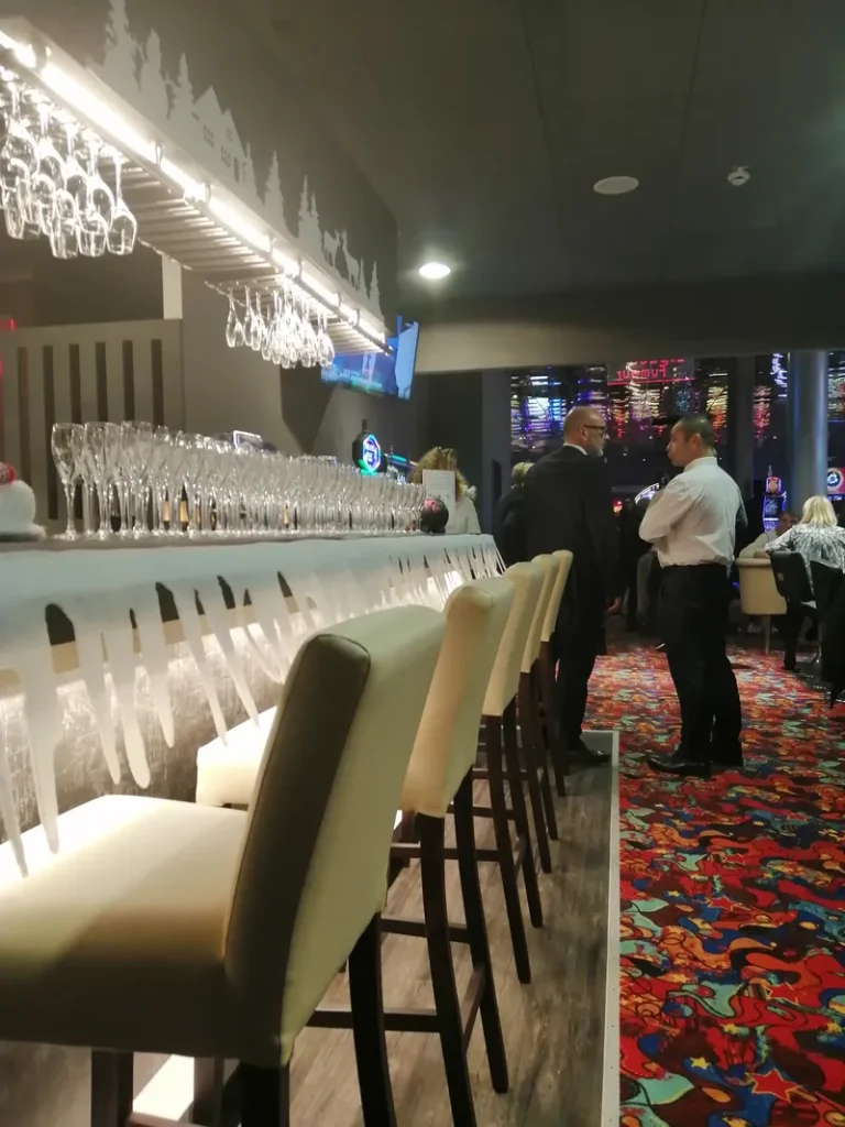 Illuminated bar and lounge seating at Casino de Fréjus