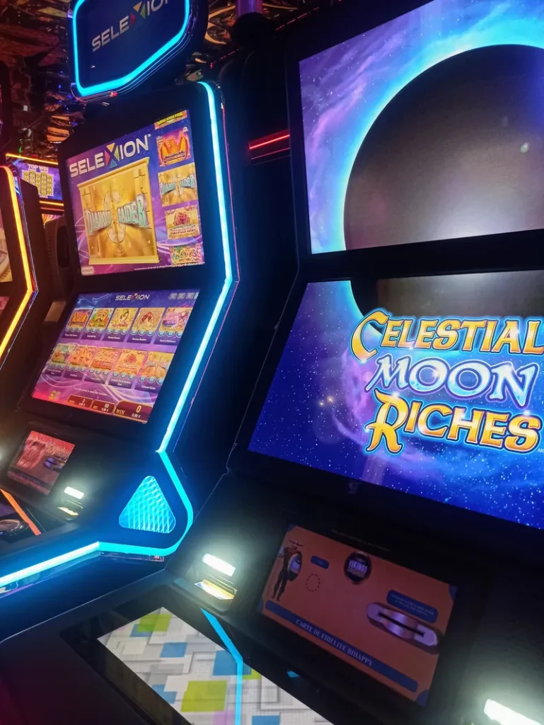 Close view of a glowing slot machine at Casino de Fréjus