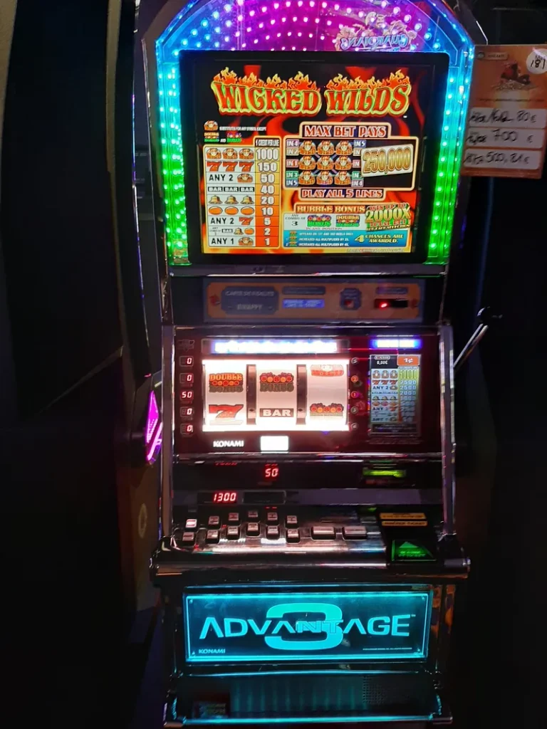 Close view of an illuminated slot machine at Casino de Houlgate