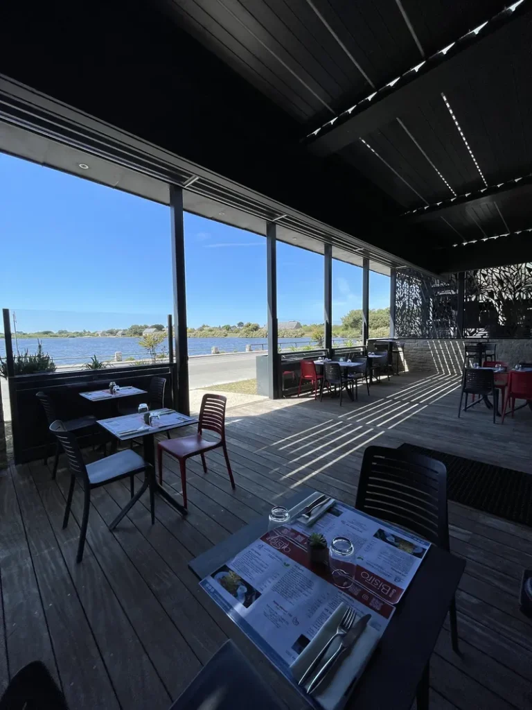 Lounge seating beside panoramic windows at Circus Casino Carnac